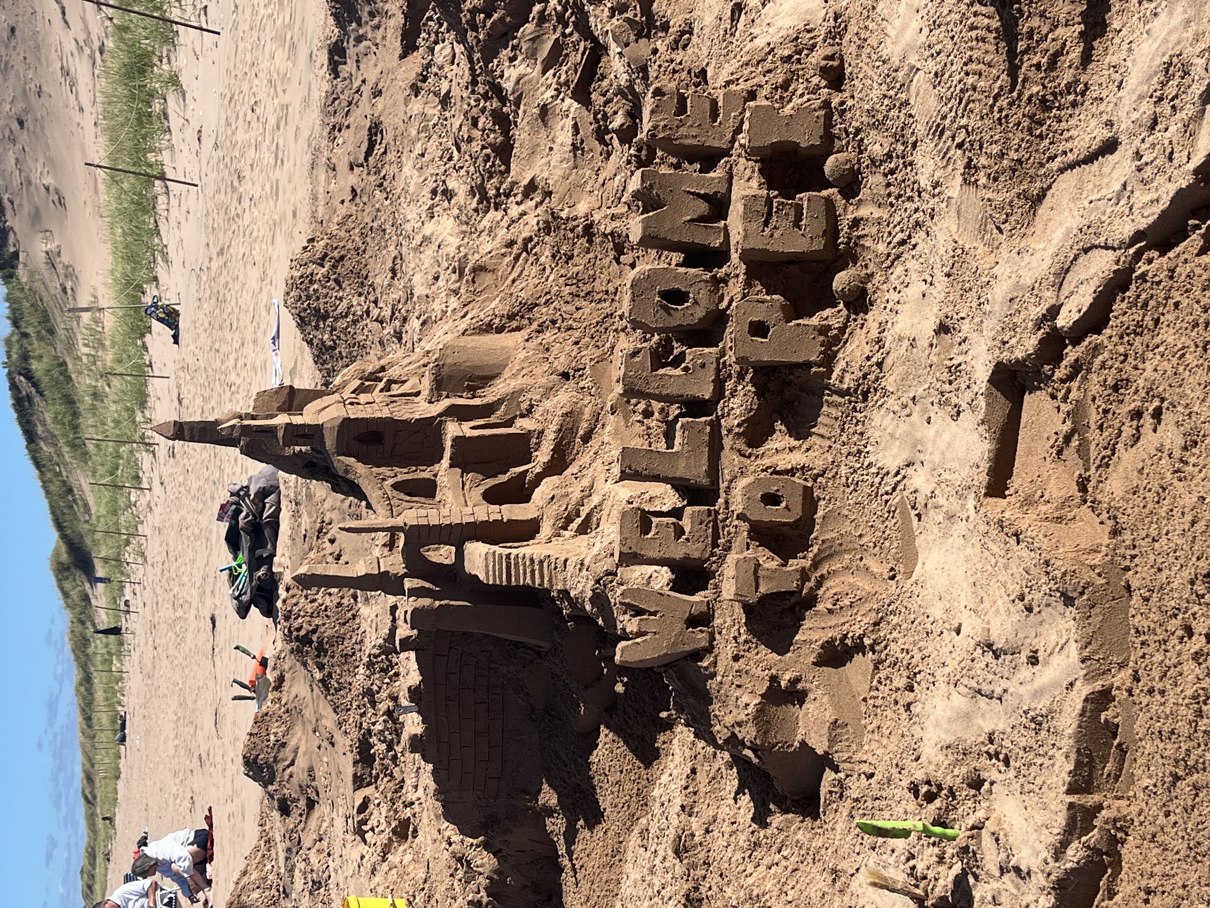 Building a sandcastle on the beach