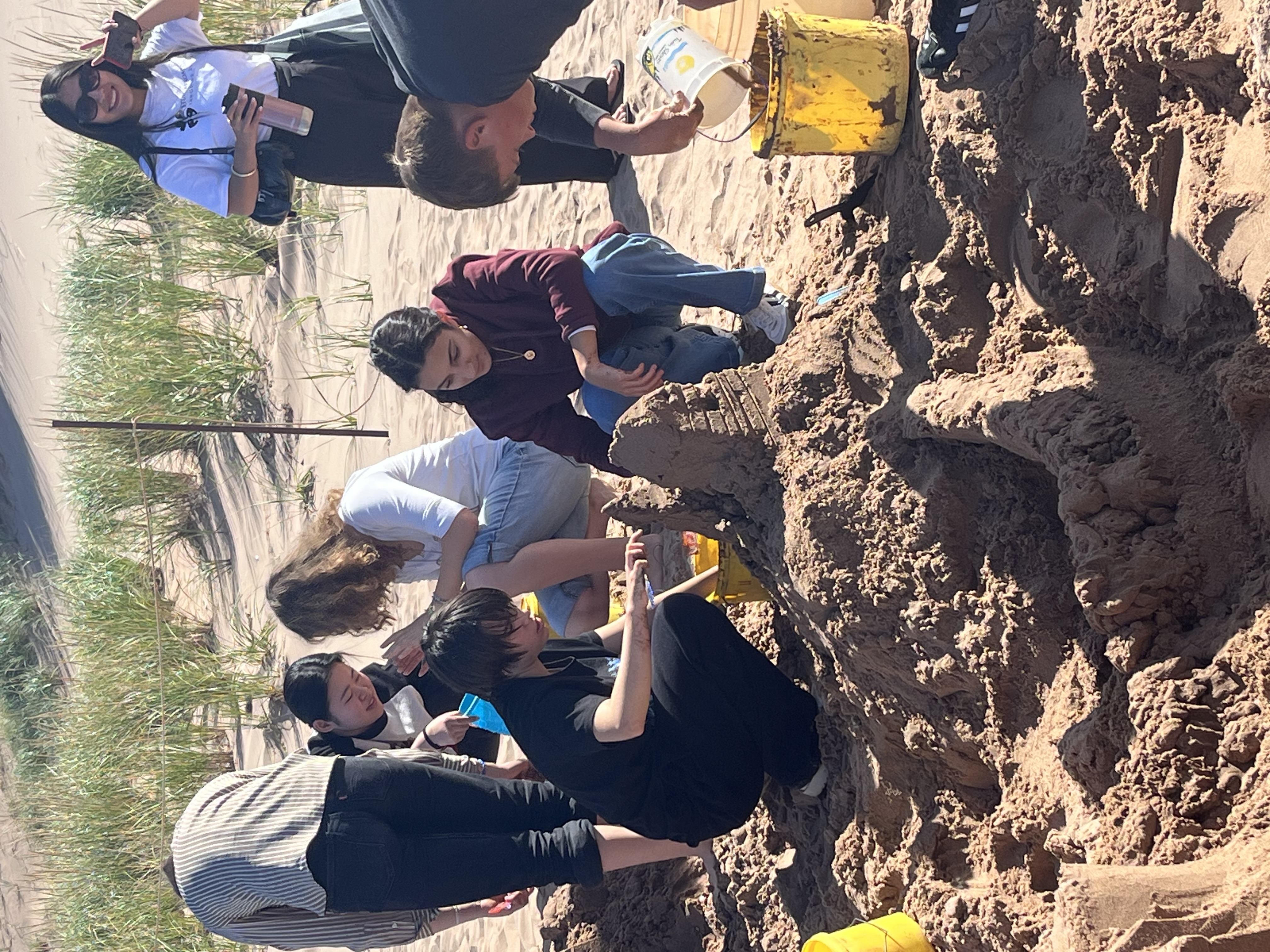 Building a sandcastle on the beach