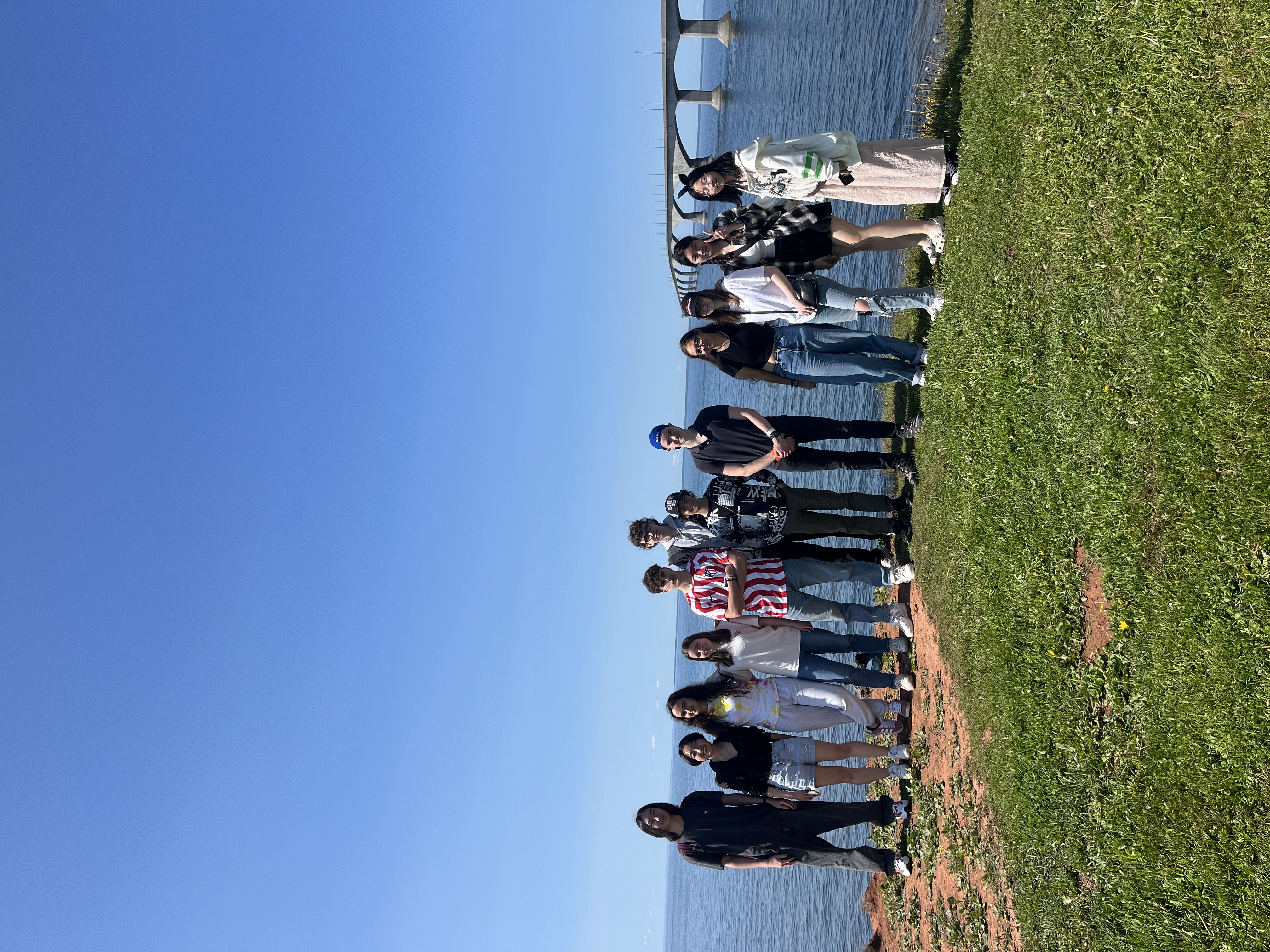 Two friends smiling at a school event
