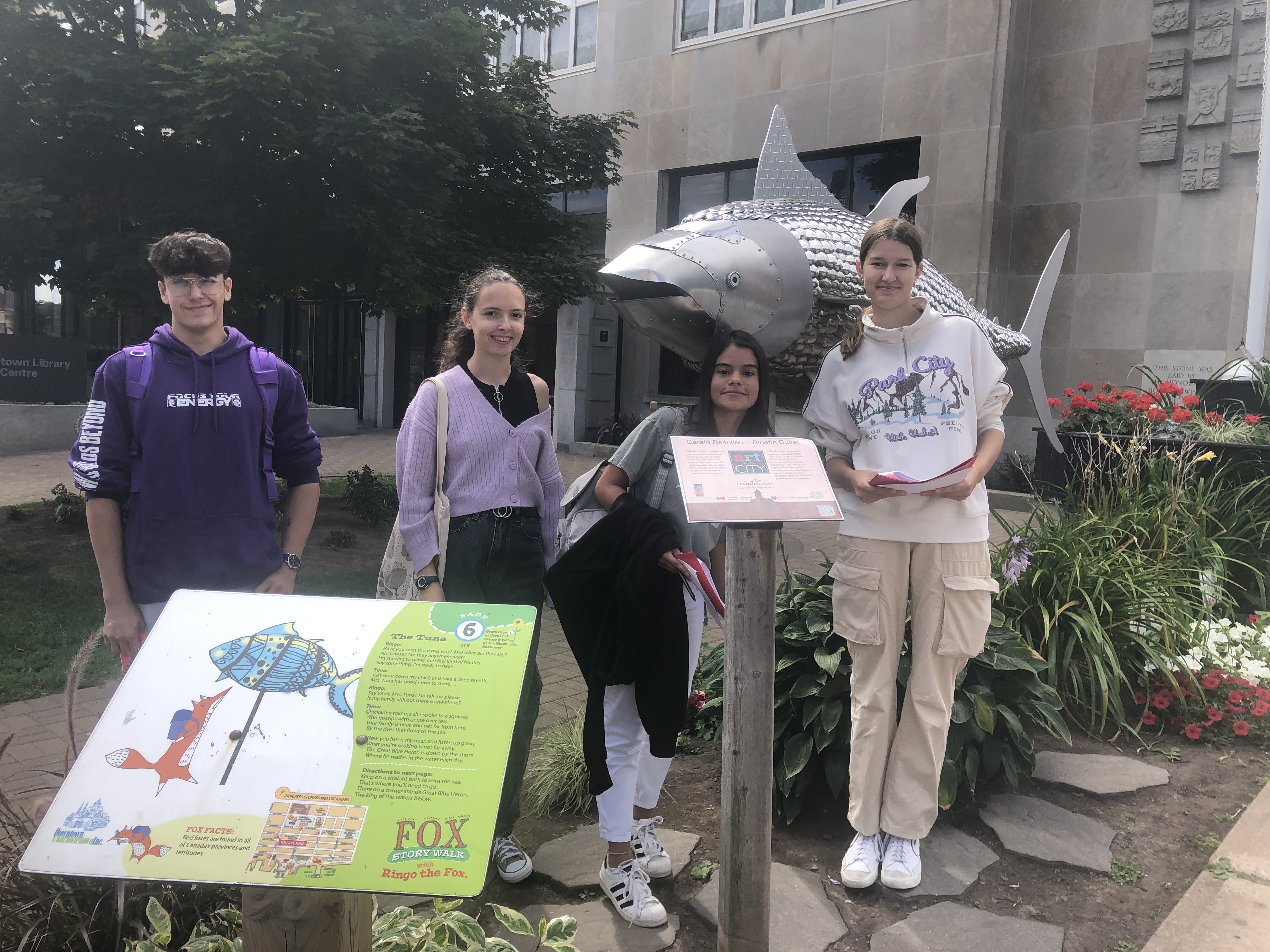 Friends posing together on campus